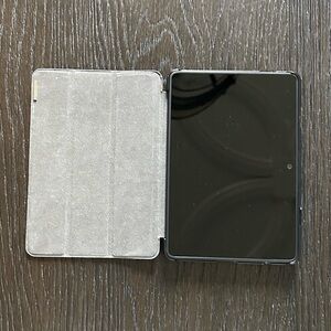 Amazon Kindle Fire HDX 3rd Generation with pink case.